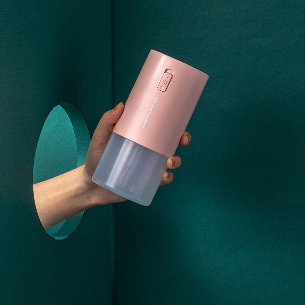 Groene Far-A-We aromadiffuser voor accessoires, zichtbaar van dichtbij afgebeeld